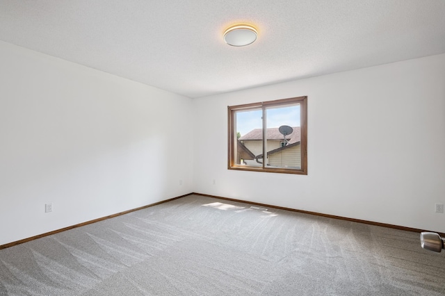 8341 Abbott Ave N, Brooklyn Park, MN 55443 - spare room featuring carpet