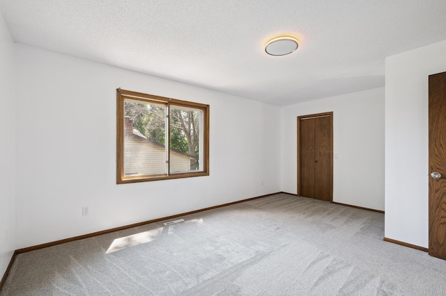 8341 Abbott Ave N, Brooklyn Park, MN 55443 - carpeted spare room featuring baseboards