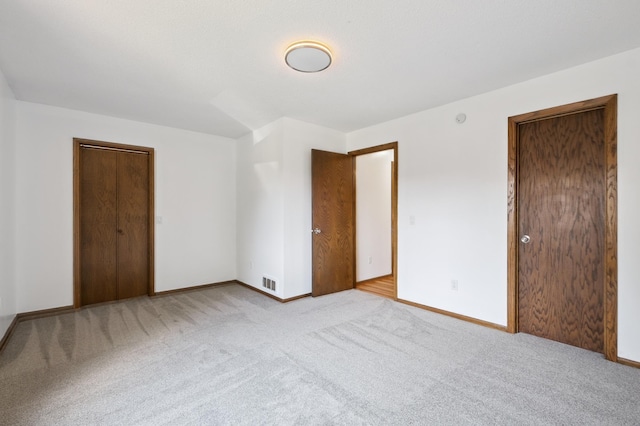 8341 Abbott Ave N, Brooklyn Park, MN 55443 - unfurnished bedroom featuring carpet flooring and baseboards