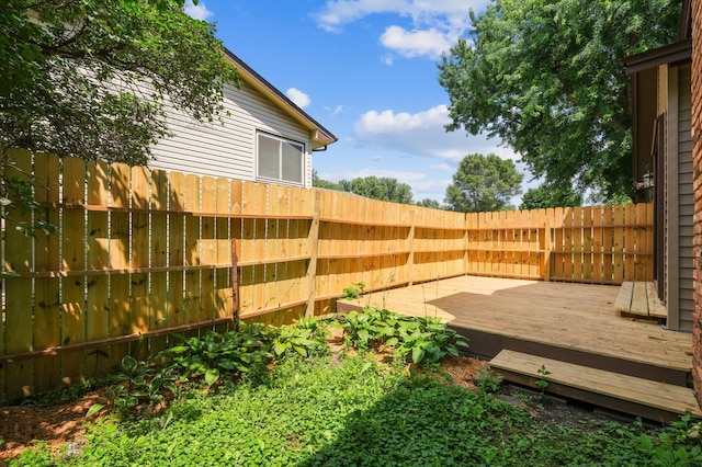 8341 Abbott Ave N, Brooklyn Park, MN 55443 - fenced backyard featuring a deck