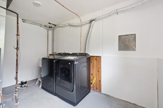 8341 Abbott Ave N, Brooklyn Park, MN 55443 - laundry room with independent washer and dryer and a textured ceiling