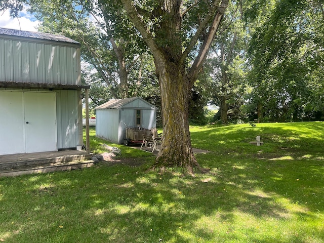 62871 230th St, Litchfield, MN 55355 - view of grassy yard with a shed