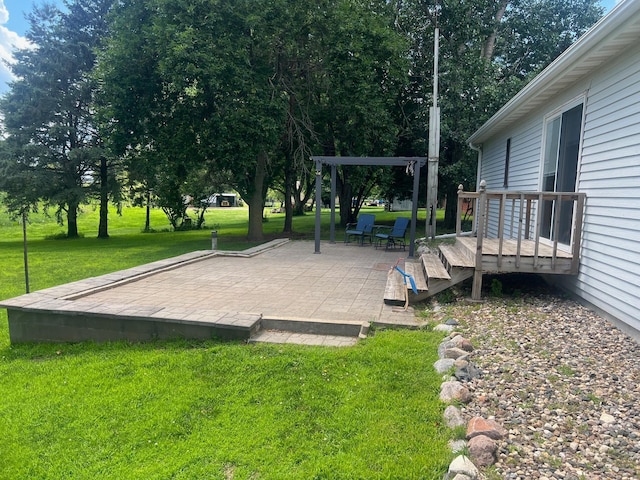 62871 230th St, Litchfield, MN 55355 - view of grassy yard with a patio