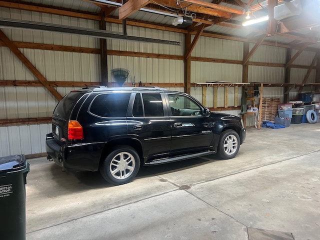 62871 230th St, Litchfield, MN 55355 - garage with a garage door opener and metal wall