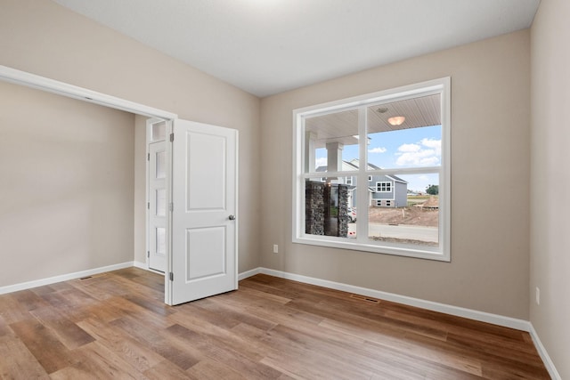 17233 61st St NE, Otsego, MN 55374 - unfurnished bedroom with light wood finished floors