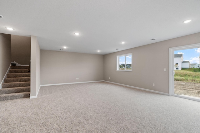 17233 61st St NE, Otsego, MN 55374 - basement with light carpet, recessed lighting, and stairs