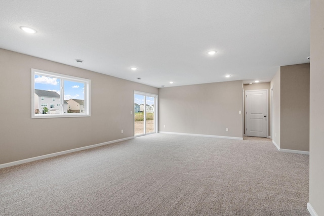 17233 61st St NE, Otsego, MN 55374 - unfurnished room with light carpet and recessed lighting