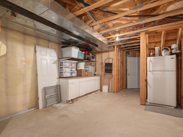 2606 Boulder Way, Burnsville, MN 55337 - unfinished basement featuring freestanding refrigerator