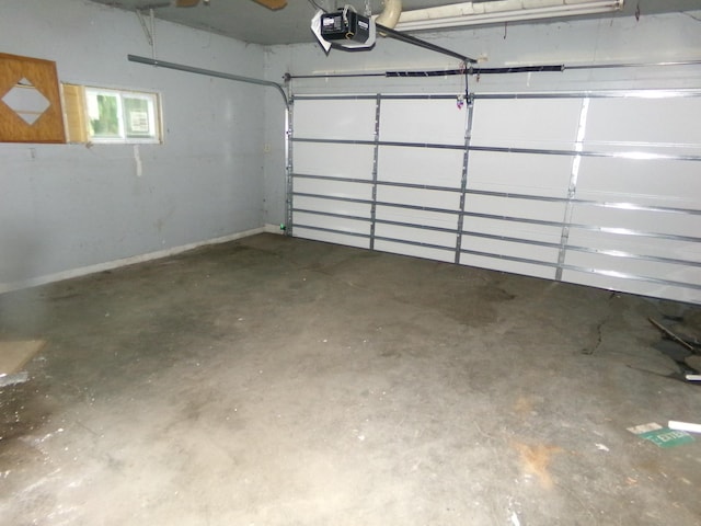 308 Main St W, Carver, MN 55315 - garage featuring a garage door opener and baseboards
