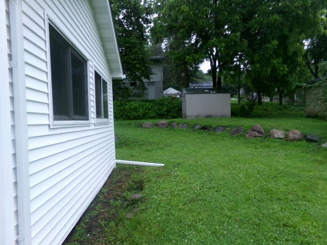 308 Main St W, Carver, MN 55315 - view of green lawn featuring a storage shed