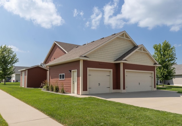 3875 Virgo Ln SW, Rochester, MN 55902 - view of side of home featuring a garage, driveway, a yard, and roof with shingles