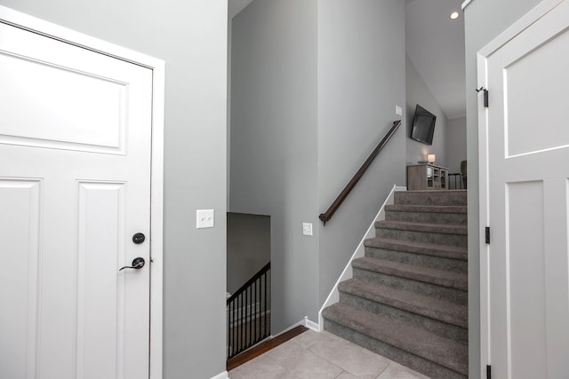 3875 Virgo Ln SW, Rochester, MN 55902 - staircase with tile patterned floors and recessed lighting