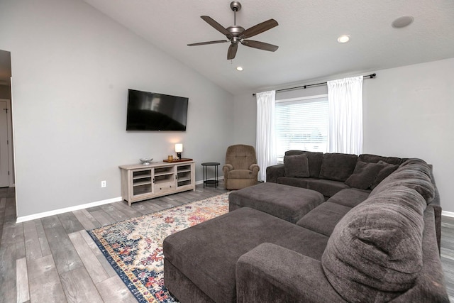 3875 Virgo Ln SW, Rochester, MN 55902 - living room featuring ceiling fan, vaulted ceiling, wood finished floors, and recessed lighting