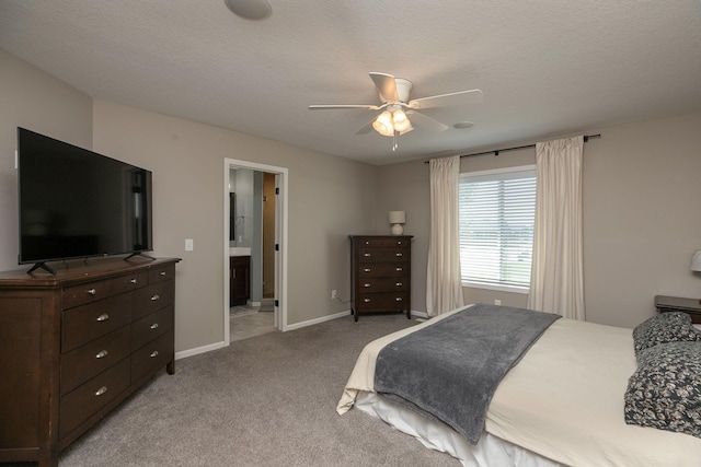 3875 Virgo Ln SW, Rochester, MN 55902 - bedroom with light colored carpet, ensuite bath, and ceiling fan