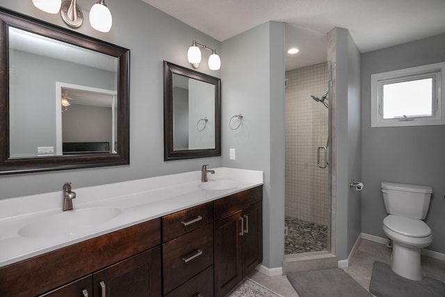 3875 Virgo Ln SW, Rochester, MN 55902 - bathroom with a shower stall and double vanity
