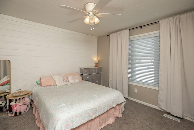 3875 Virgo Ln SW, Rochester, MN 55902 - carpeted bedroom featuring a ceiling fan and a textured ceiling