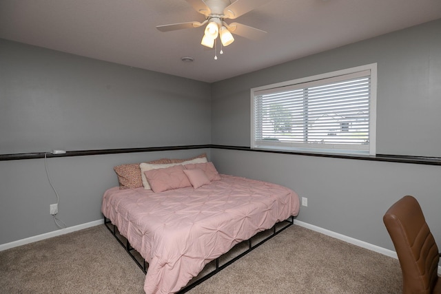 3875 Virgo Ln SW, Rochester, MN 55902 - carpeted bedroom featuring baseboards and ceiling fan