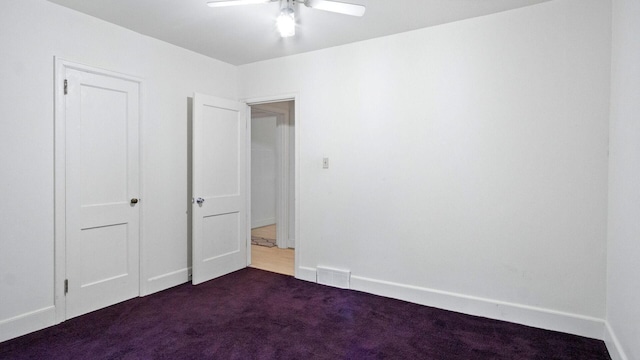 507 15th St SE, Menomonie, WI 54751 - unfurnished bedroom with carpet flooring and ceiling fan