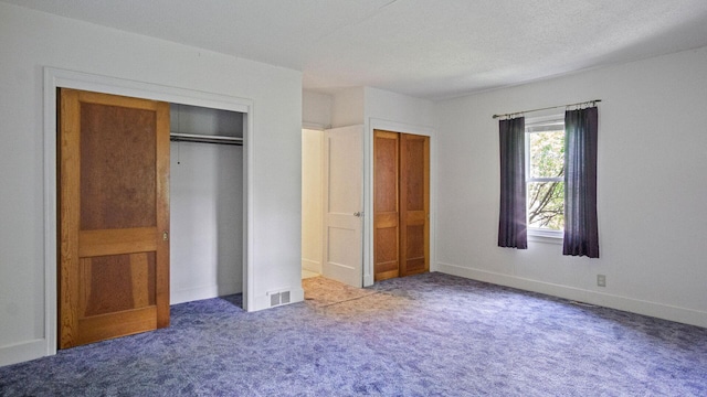 507 15th St SE, Menomonie, WI 54751 - unfurnished bedroom featuring carpet floors and baseboards