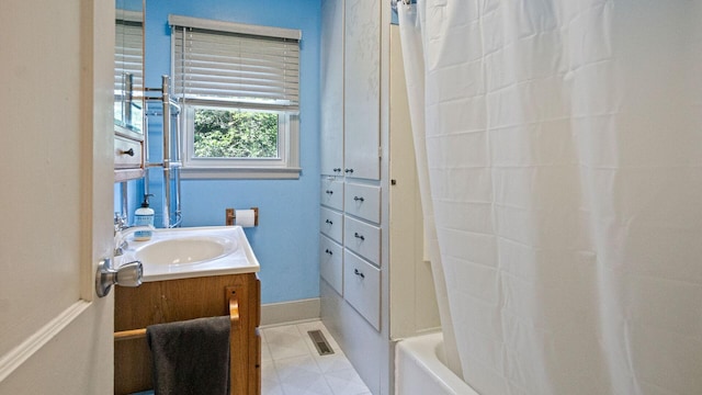 507 15th St SE, Menomonie, WI 54751 - bathroom featuring vanity and shower / bath combo