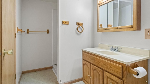 507 15th St SE, Menomonie, WI 54751 - bathroom featuring vanity and baseboards