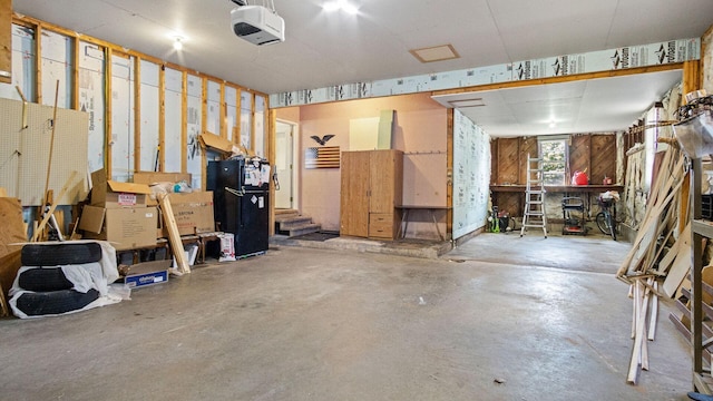 507 15th St SE, Menomonie, WI 54751 - garage featuring a garage door opener
