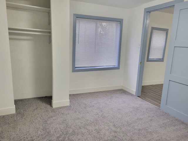 1410 5th St, Saint Paul Park, MN 55071 - unfurnished bedroom featuring carpet flooring and a closet