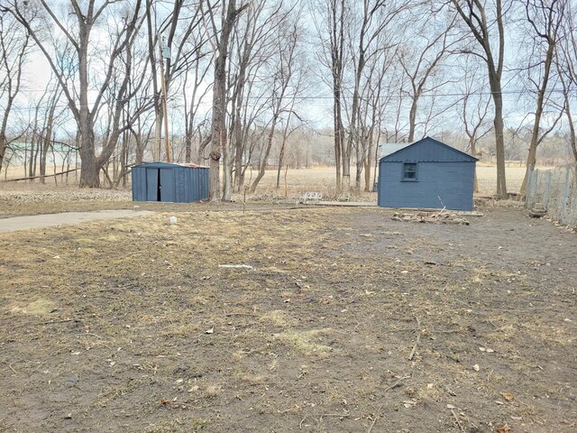 1410 5th St, Saint Paul Park, MN 55071 - view of yard featuring a storage shed