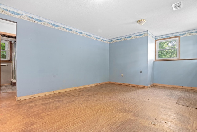 5781 Needham Ave NE, Saint Michael, MN 55376 - empty room with wood finished floors and baseboards