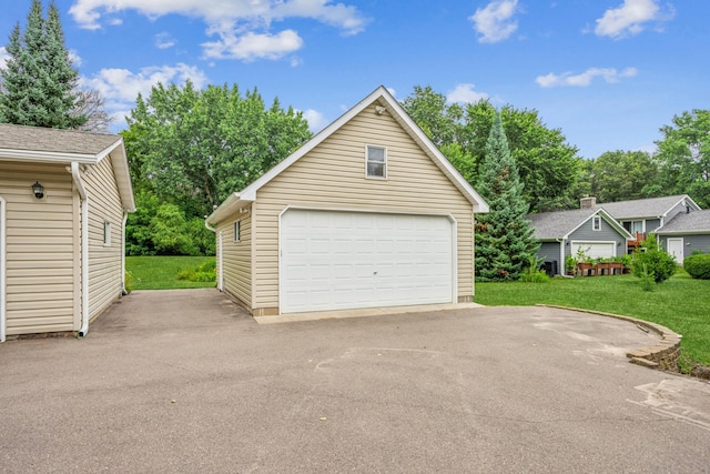 487 Lois Ln, Lino Lakes, MN 55014 - detached garage with view of scattered trees