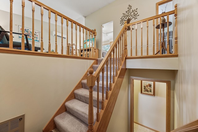 487 Lois Ln, Lino Lakes, MN 55014 - staircase with a towering ceiling