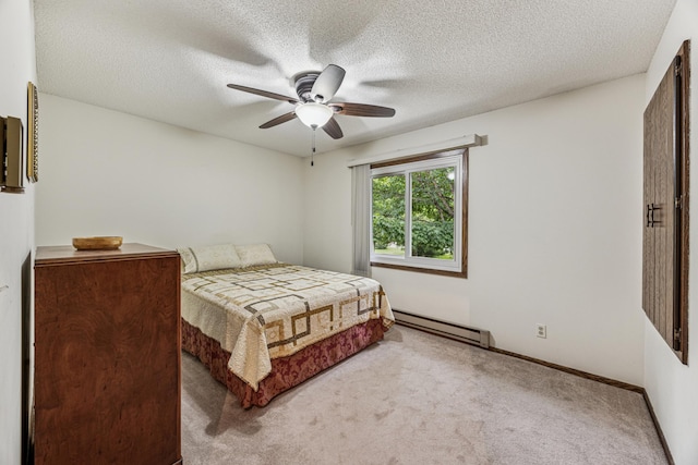 487 Lois Ln, Lino Lakes, MN 55014 - bedroom with baseboard heating, light carpet, a ceiling fan, and a textured ceiling