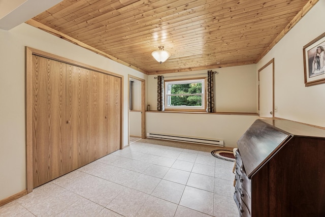487 Lois Ln, Lino Lakes, MN 55014 - unfurnished bedroom featuring a baseboard heating unit, wooden ceiling, light tile patterned floors, and a closet