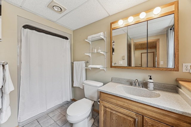 487 Lois Ln, Lino Lakes, MN 55014 - full bathroom featuring vanity, tile patterned floors, a drop ceiling, and a shower with shower curtain