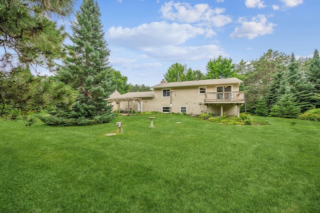 487 Lois Ln, Lino Lakes, MN 55014 - back of property featuring a lawn and a chimney