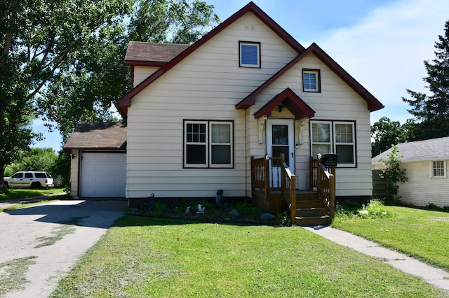 216 6th St W, Thief River Falls, MN 56701 - bungalow-style home featuring driveway, a front yard, roof with shingles, and a garage