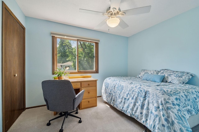 6240 Decatur Ave N, Brooklyn Park, MN 55428 - bedroom featuring light carpet, a closet, an office area, and ceiling fan