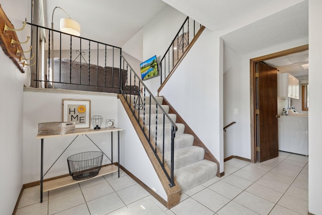 6240 Decatur Ave N, Brooklyn Park, MN 55428 - staircase with tile patterned floors
