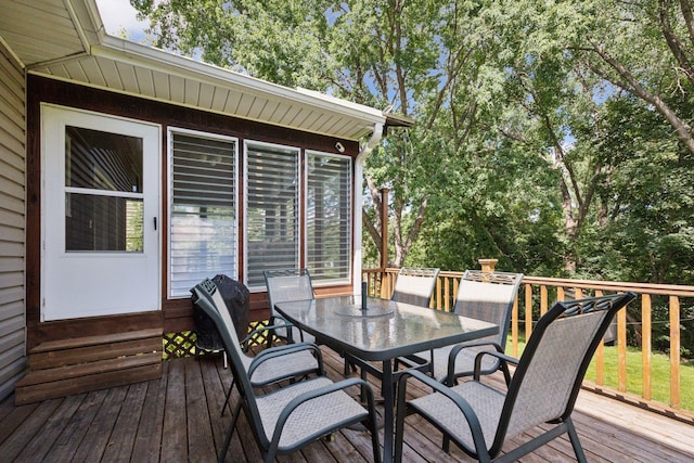 6240 Decatur Ave N, Brooklyn Park, MN 55428 - wooden terrace featuring outdoor dining area