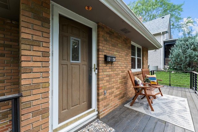 1228 Palace Ave, Saint Paul, MN 55105 - doorway to property featuring brick siding and covered porch