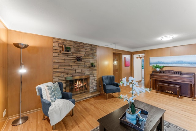 1228 Palace Ave, Saint Paul, MN 55105 - living area featuring wood finished floors and a stone fireplace