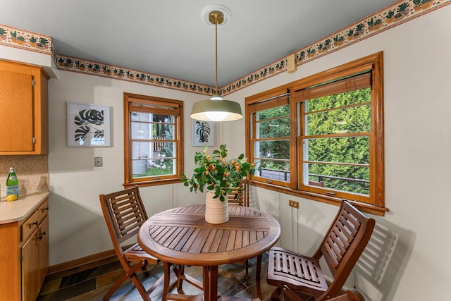 1228 Palace Ave, Saint Paul, MN 55105 - dining space featuring baseboards and stone finish floors