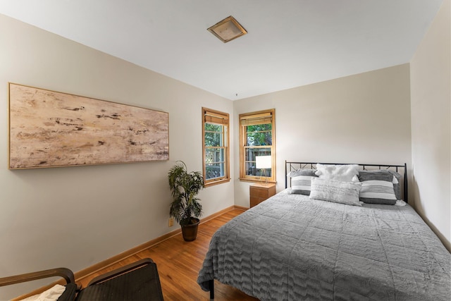 1228 Palace Ave, Saint Paul, MN 55105 - bedroom with wood finished floors and baseboards
