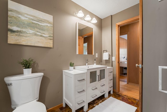 1228 Palace Ave, Saint Paul, MN 55105 - bathroom with vanity and a textured ceiling