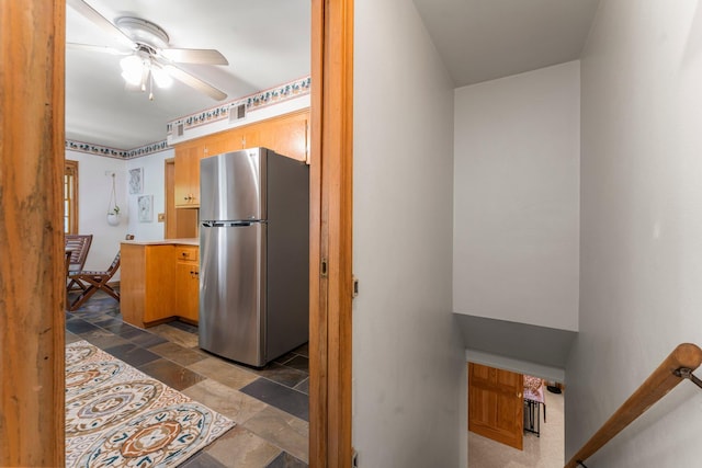 1228 Palace Ave, Saint Paul, MN 55105 - kitchen featuring freestanding refrigerator, stone tile floors, ceiling fan, and light countertops