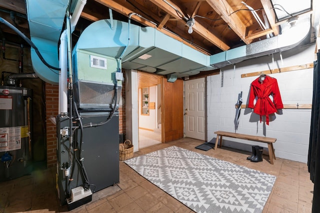 1228 Palace Ave, Saint Paul, MN 55105 - unfinished basement with water heater and concrete block wall