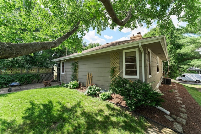 1228 Palace Ave, Saint Paul, MN 55105 - view of side of property featuring a chimney and a cooling unit