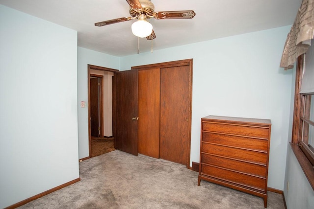 1705 California Ave E, Saint Paul, MN 55106 - bedroom with carpet, a closet, and a ceiling fan