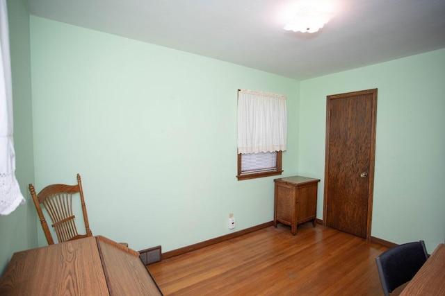 1705 California Ave E, Saint Paul, MN 55106 - unfurnished bedroom with light wood finished floors and baseboards