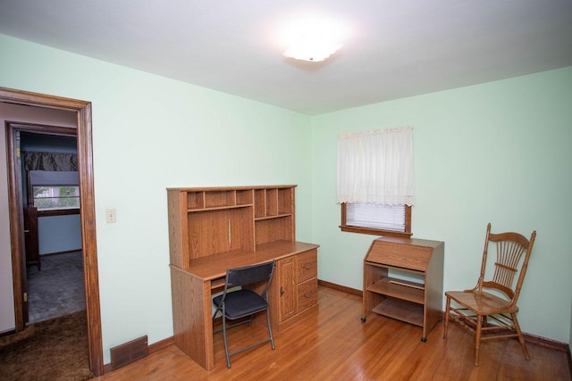 1705 California Ave E, Saint Paul, MN 55106 - office area with light wood-type flooring and baseboards